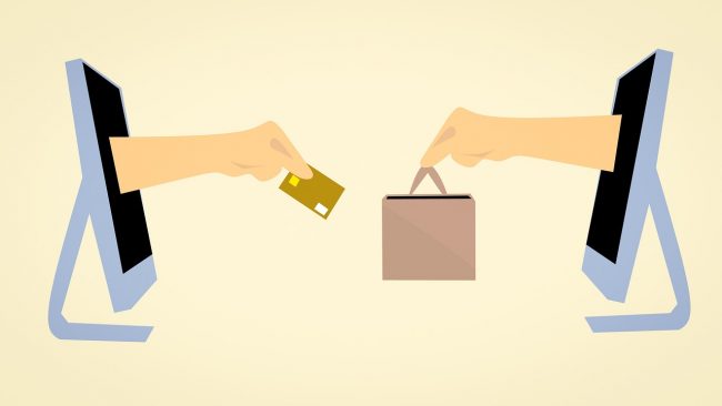 E-commerce transaction through two computers for a retail company